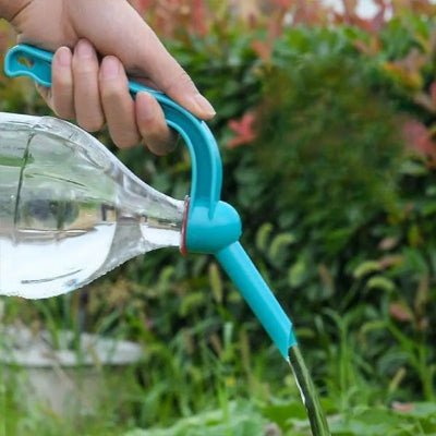 Pomme D'Arrosoir Pour Bouteille VERSEAU bleu déversant en mode collonne d'eau
